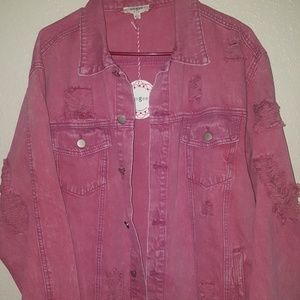 We with tags pink distressed jean jacket.